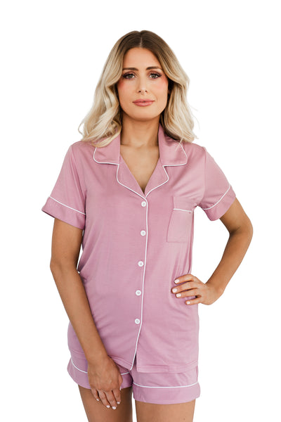 Woman in Pink Bamboo Short Pyjama Set with Soft, Breathable Material for Maximum Comfort in Warm Weather"